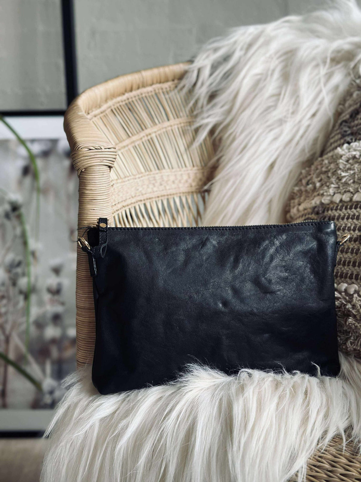 Clutch i svart skinn